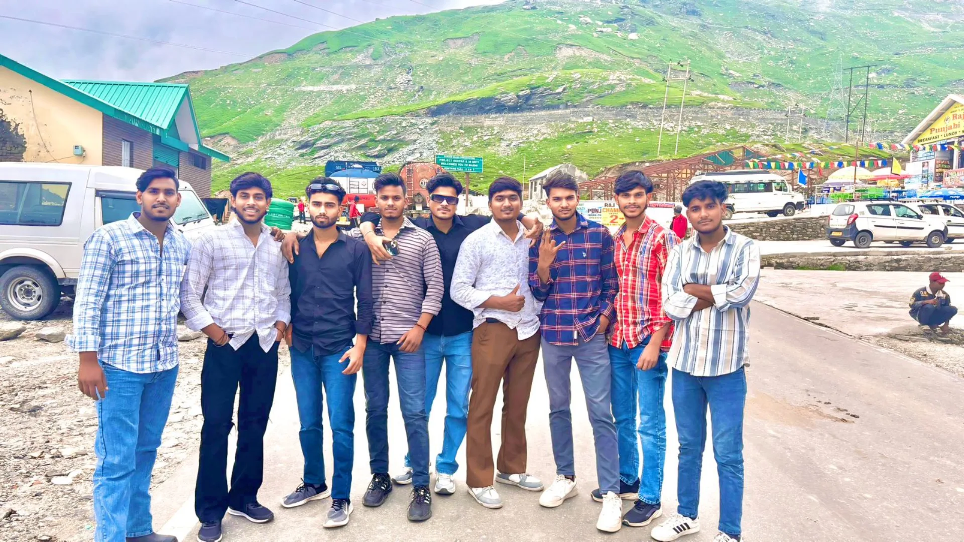 Group of happy travelers with Go Stride Adventures in the mountains